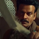 A man with a serious expression, holding a machete, looks intently at something off-screen, set against a patterned background